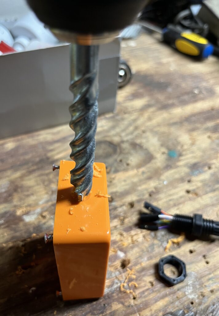Drilling a hole in the project box for the USB serial cable cord grip
