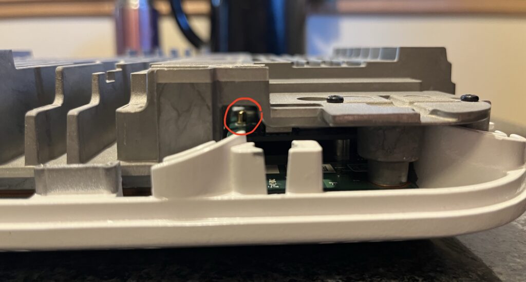 Antenna connector far underneath the huge heatsink.