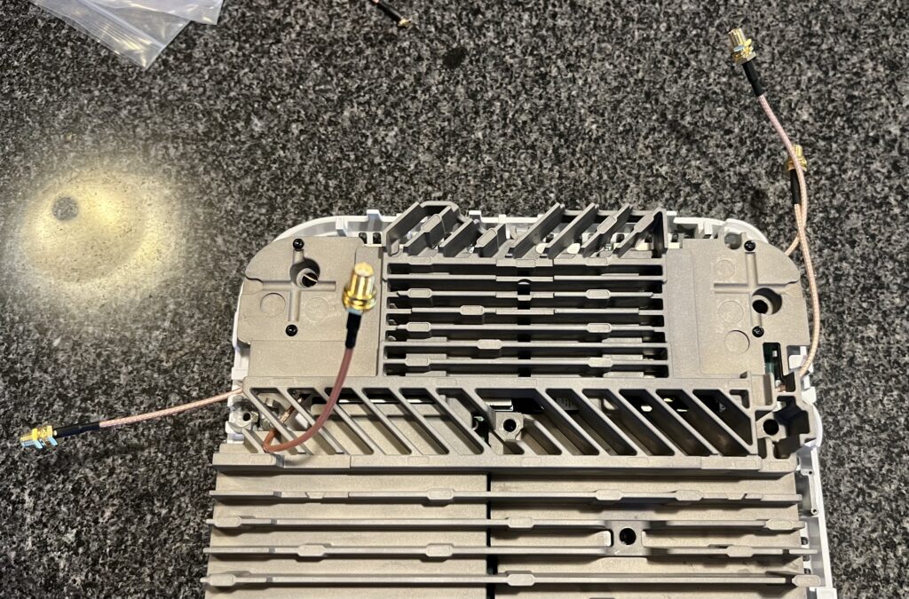 SMA pigtails routed around the re-installed heatsink.