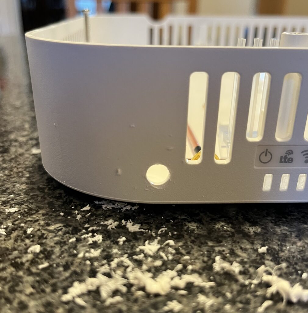 Hole drilled in top case for SMA connector.