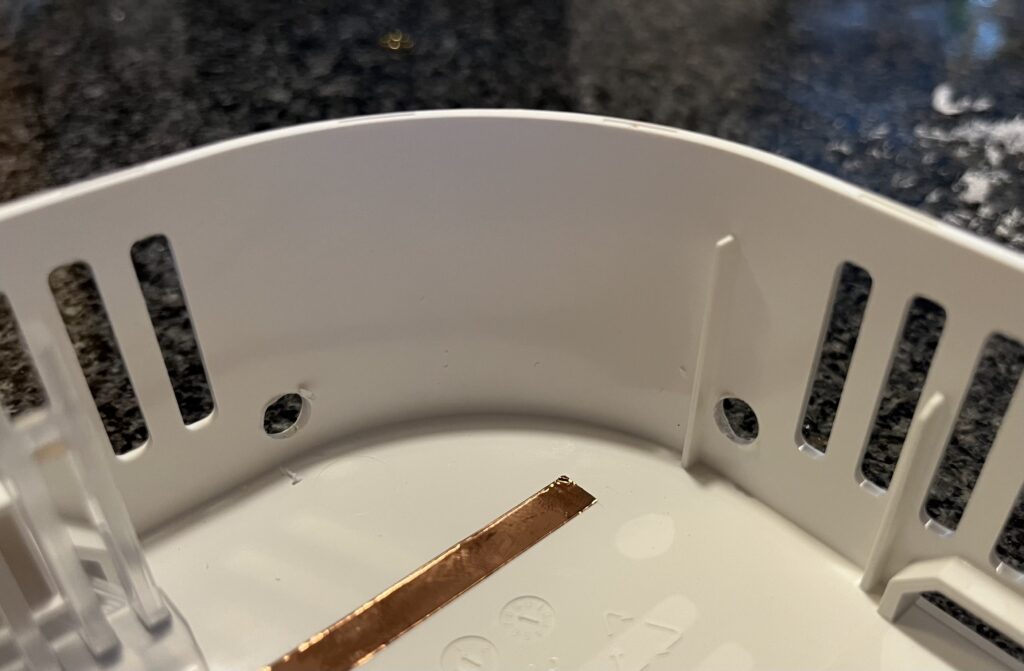 Two more holes drilled in the top cover for SMA connectors.
